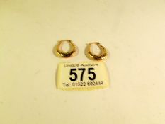A pair of 9ct gold hoop earrings (1.