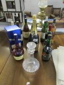 A quantity of unopened bottles of alcohol including a magnum of champagne