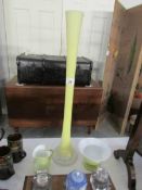 A tall lemon glass specimen vase,