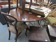 A mahogany double pedestal dining table