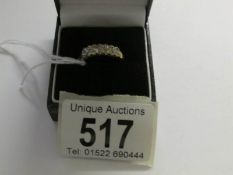 A 14 stone yellow gold diamond ring, marked 925.