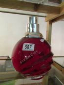 A large Givenchy display scent bottle