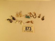 7 pairs of assorted pendant earrings including gold