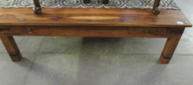 A large rustic coffee table