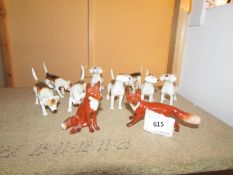 A Beswick hunting group consisting of 8 hounds and 2 foxes