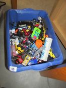 A large box of die cast vehicles