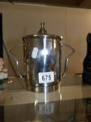 An unusual two handled silver plated biscuit barrel by Yeoman Plate,