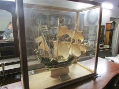 A model galleon in glass case