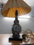 An oriental (possibly Japanese) vase converted in to a table lamp