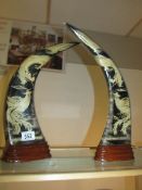 A pair of carved buffalo horns