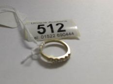 A 5 stone 9ct gold and diamond ring,