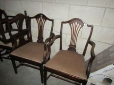 2 carver chairs and 3 dining chairs