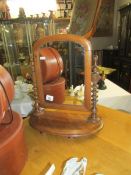 A small mahogany toilet mirror