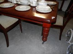A wind out dining table