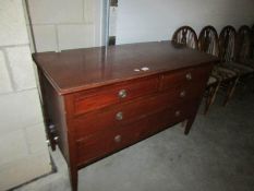 An inlaid chest of drawers