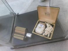 A 1960's cased Ronson electric shaver and a hip flask