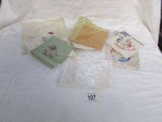 A quantity of vintage handkerchiefs and a WW1 silk card