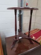 A mahogany wine table