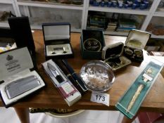 A mixed lot including cuff links, lighter,