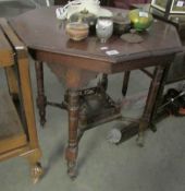 A mahogany octagonal occasional table with galleried base (gallery a/f)