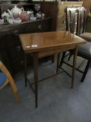 A small mahogany inlaid fold over games table