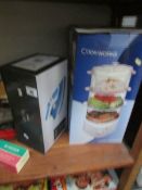 A new boxed Cookworks 3 tier steamer and a Tesco iron
