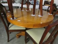 A good quality centre pedestal oak dining table