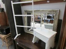 A painted towel rail and stool