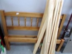 A pine bedstead complete with slats