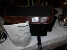 A cased Panasonic digital video camera