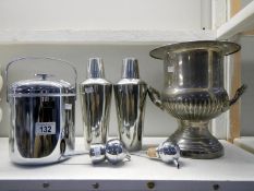 A champagne bucket, 2 cocktail shakers, ice bucket and 2 optics