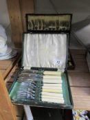 2 cased cutlery sets
