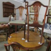 A set of 6 chairs comprising 2 carvers and 4 dining