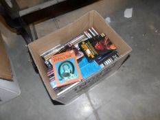 A box of CD's and audio books
