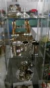 A good mixed lot of silver plate including tea sets,