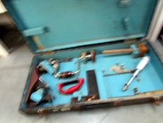 A tool box and tools