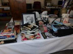 A large collection of Marilyn Monroe memorabilia including CD's, Calendars, books, bags,
