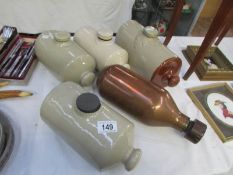 4 stoneware and a copper hot water bottle