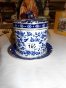 A 19th century blue and white tobacco jar (missing liner and chip to base)