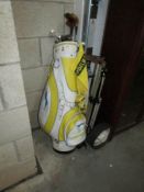 A golf bag and golf clubs