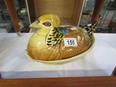 An egg crock in the form of a pheasant (a/f)