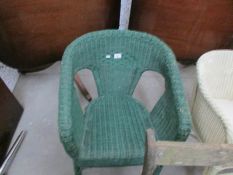 A green wicker bedroom or patio chair