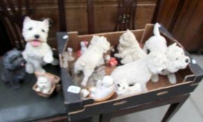 A quantity of West Highland Terrier figures