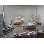 3 model ships and a ship in bottle