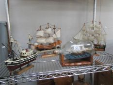 3 model ships and a ship in bottle