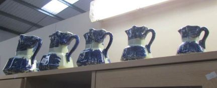 A set of 5 blue and white Victoria ware Ironstone jugs