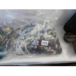 A bag of costume jewellery