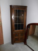 A good oak corner cabinet with lead glazed doors