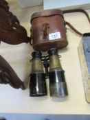 A pair of Grand Lumiere Paris cased binoculars