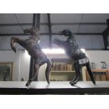 2 rearing horse figures